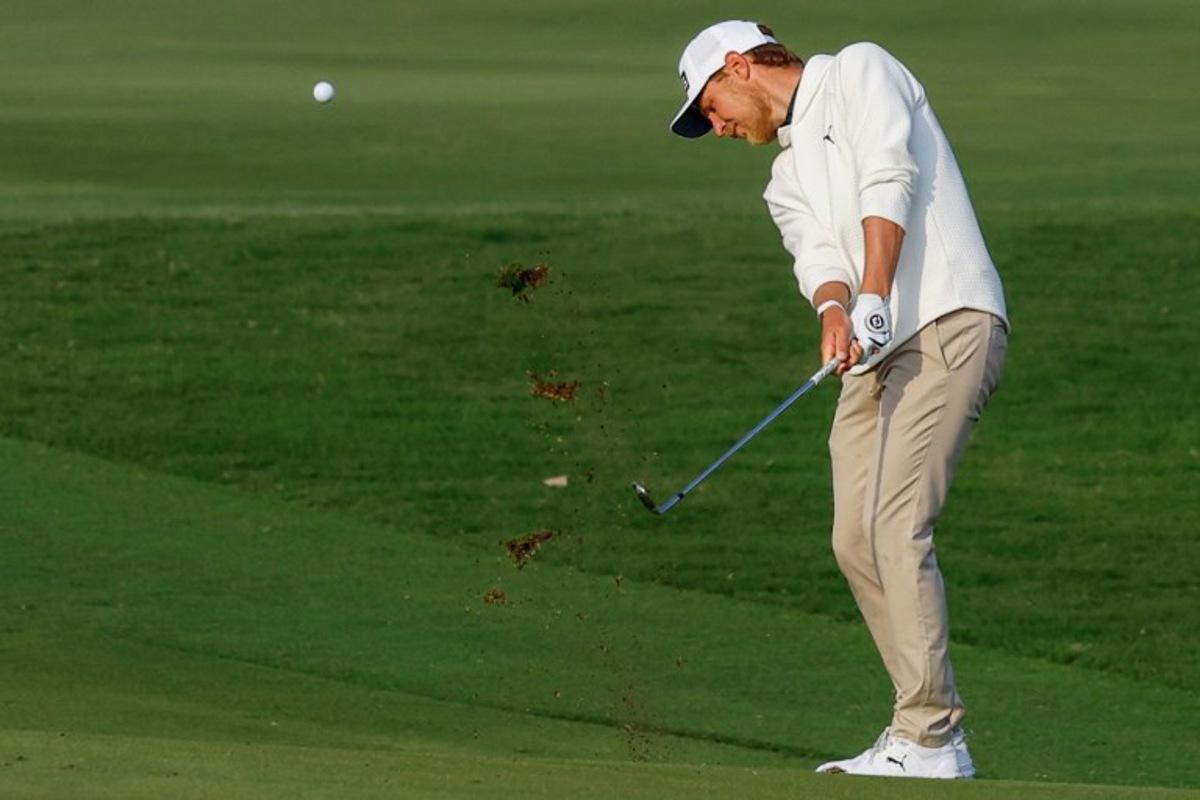 Kristoffer Reitan of Norway plays a shot during the first day of the European Tour of Qatar Masters golf tournament in Doha on February 6, 2025.  KARIM JAAFAR / AFP