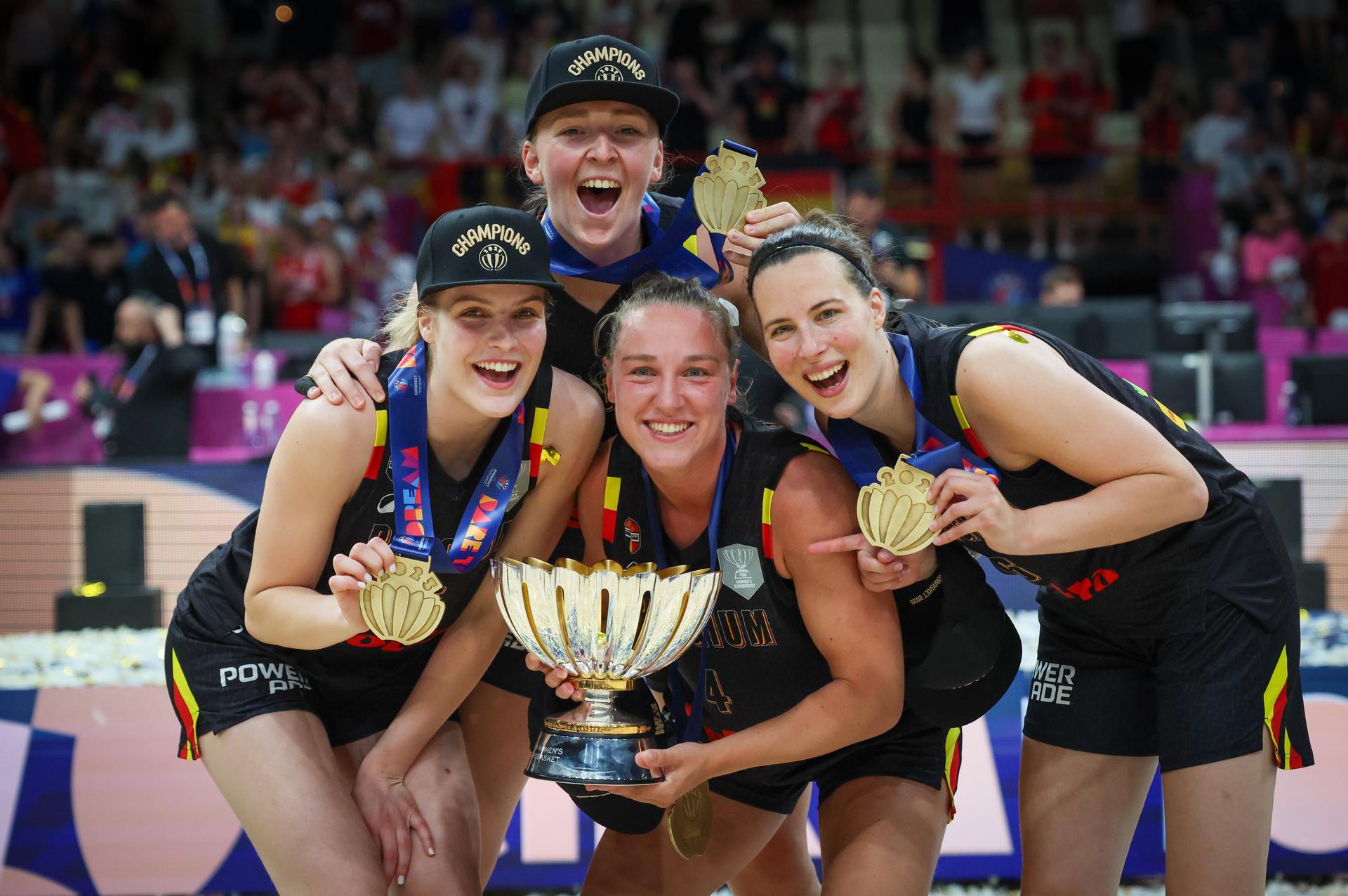 Belgium's Nastja Claessens, Belgium's Marie Vervaet, Belgium's Elise Ramette and Belgium's Antonia Delaere celebrate after winning a basketball match between Spain and Belgian national team 'the Belgian Cats' on Sunday 29 June 2025 in Piraeus, Greece, the final of the FIBA Women's EuroBasket 2025. BELGA PHOTO VIRGINIE LEFOUR