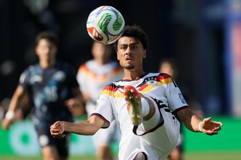 Germany's defender #18 Nathaniel Brown kicks the ball during the 2026 World Cup round of 32 football match between Germany and Paraguay at the Boston Stadium in Foxborough on June 29, 2026.   Odd ANDERSEN / AFP