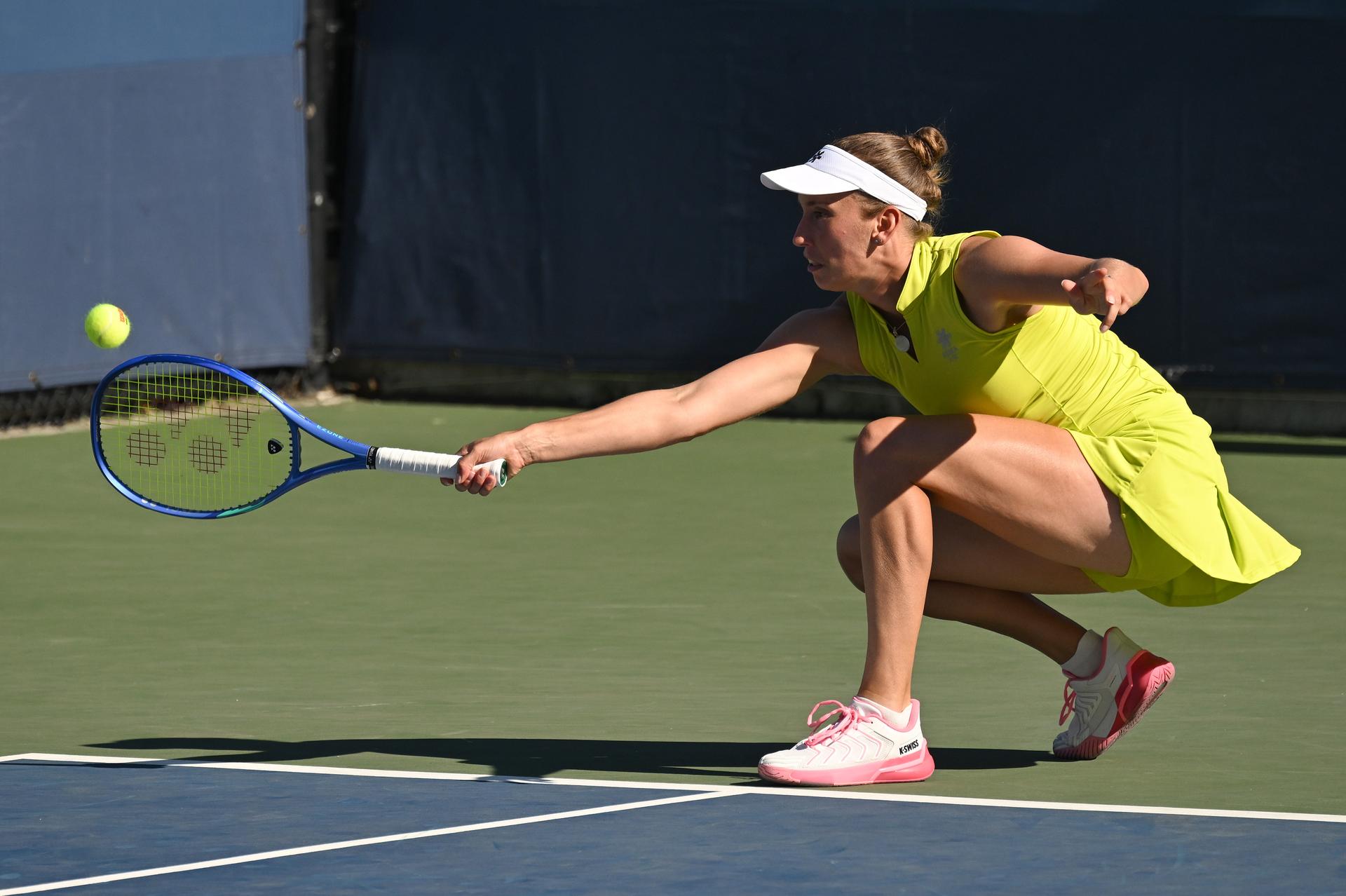 Belgian Elise Mertens (yellow) pictured during a tennis match with Kudermetova against US pair Brantmeier-Hamilton, in the second round of the women's doubles of the 2025 US Open Grand Slam tennis tournament in New York City, USA, Saturday 30 August 2025. BELGA PHOTO TONY BEHAR