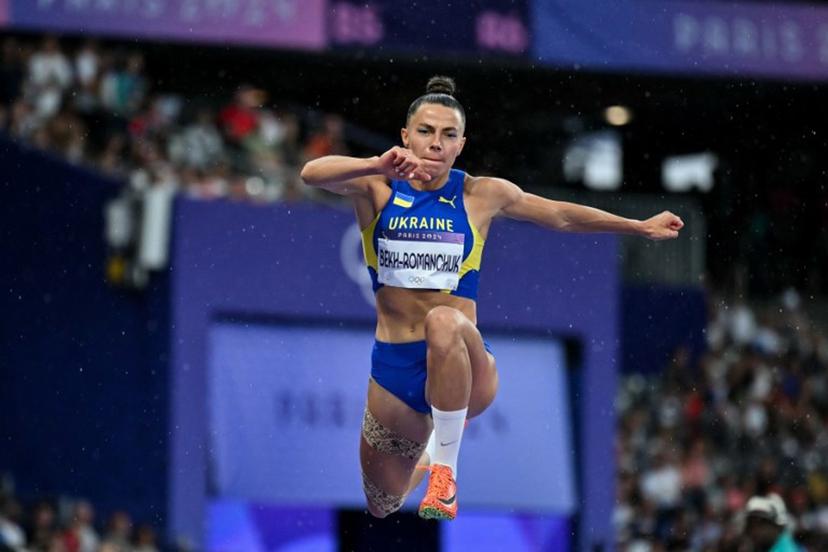 Ukraine's Maryna Bekh-Romanchuk competes in the women's triple jump final of the athletics event at the Paris 2024 Olympic Games at Stade de France in Saint-Denis, north of Paris, on August 3, 2024.  Andrej ISAKOVIC / AFP