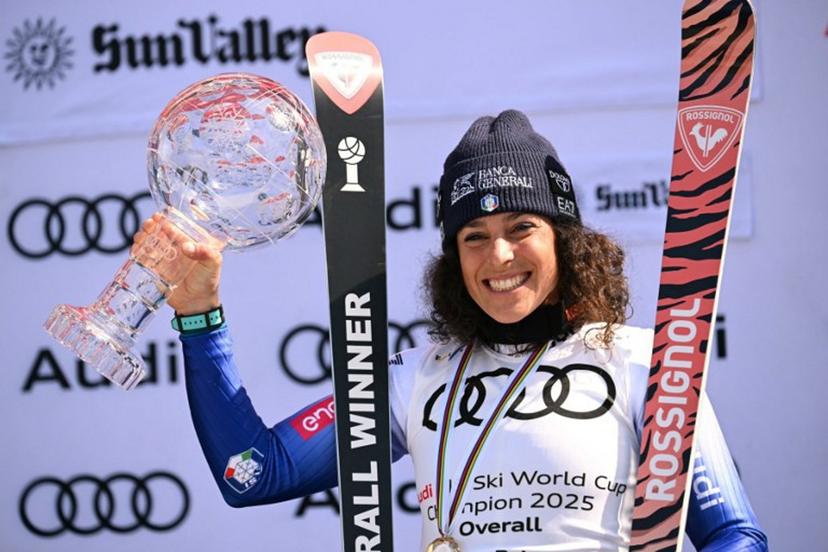 Women's overall winner Federica Brignone celebrates with the crystal globe on the podium at the 2025 FIS Alpine World Cup Finals at Sun Valley Resort in Sun Valley, Idaho, on March 27, 2025.  Patrick T. Fallon / AFP