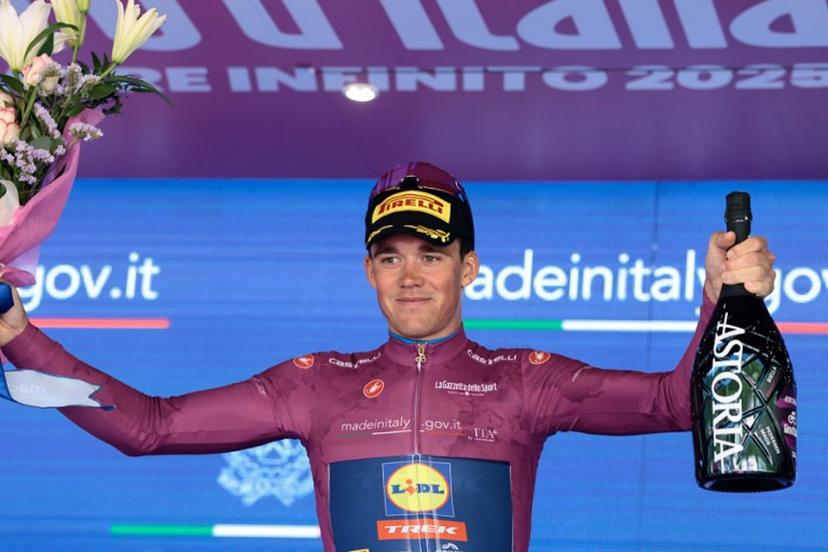 Lidl-Trek's Danish rider Mads Pedersen wearing the cyclamen jersey of best sprinter (Maglia Ciclamino) celebrates on the podium after the 19th stage of the 108th Giro d'Italia cycling race of 166kms from Biella to Champoluc on May 30, 2025.  Luca Bettini / AFP