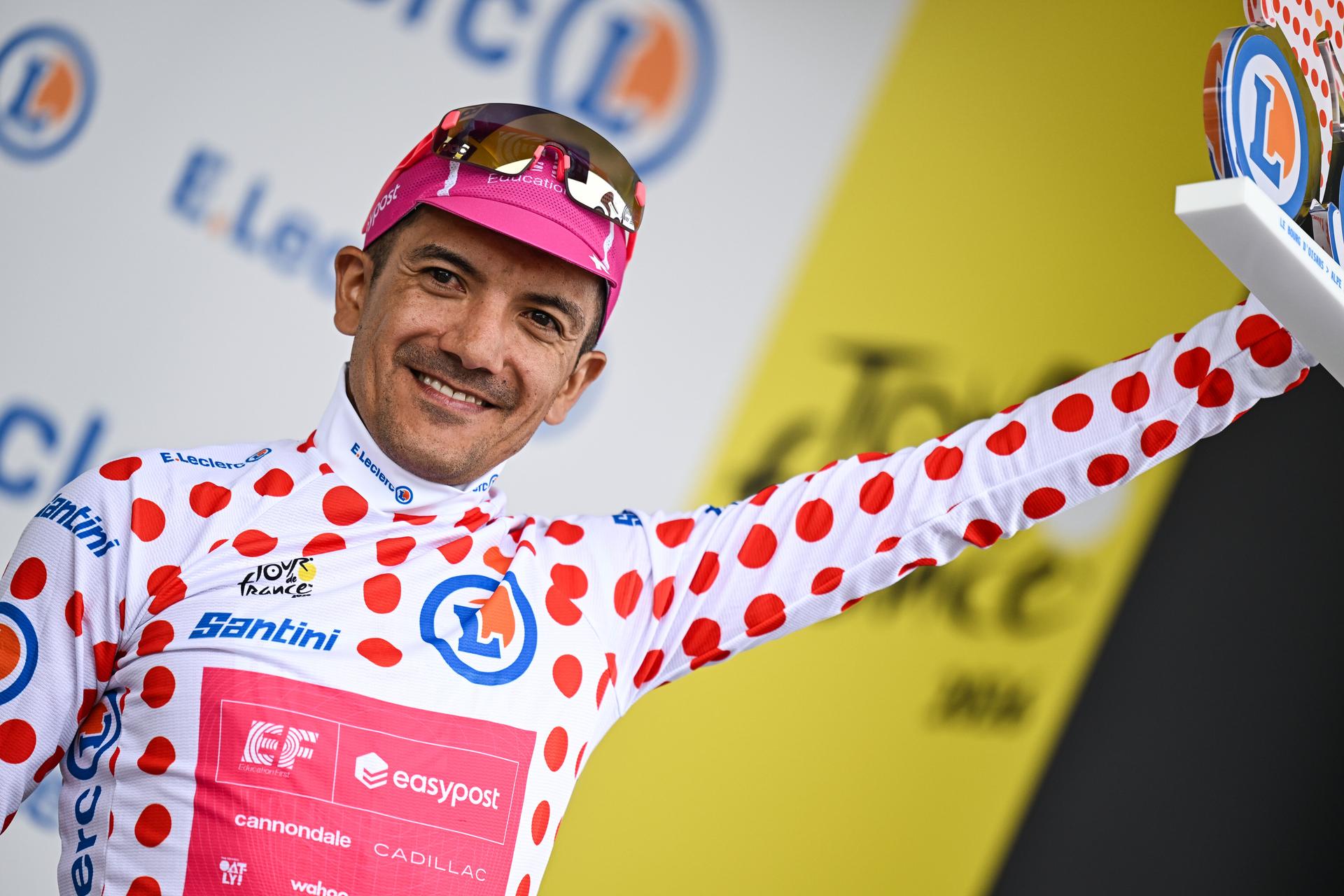 Ecuadorian Richard Carapaz of EF Education-EasyPost celebrates on the podium in the red polka-dot jersey for best climber after stage 20 of the 2026 Tour de France cycling race, a stage of 171km Le Bourg d'Oisans to Alpe d'Huez, on Saturday 25 July 2026. The 113th edition of the Tour de France starts on Saturday 4 July in Barcelona, Spain, and will finish in Paris, France on the 26th of July. BELGA PHOTO DAVID PINTENS