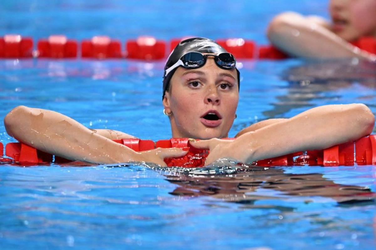 Canada's swimmer Summer Mcintosh reacts after a semi-final of the women's 200m butterfly swimming event during the 2025 World Aquatics Championships in Singapore on July 30, 2025.  Oli SCARFF / AFP