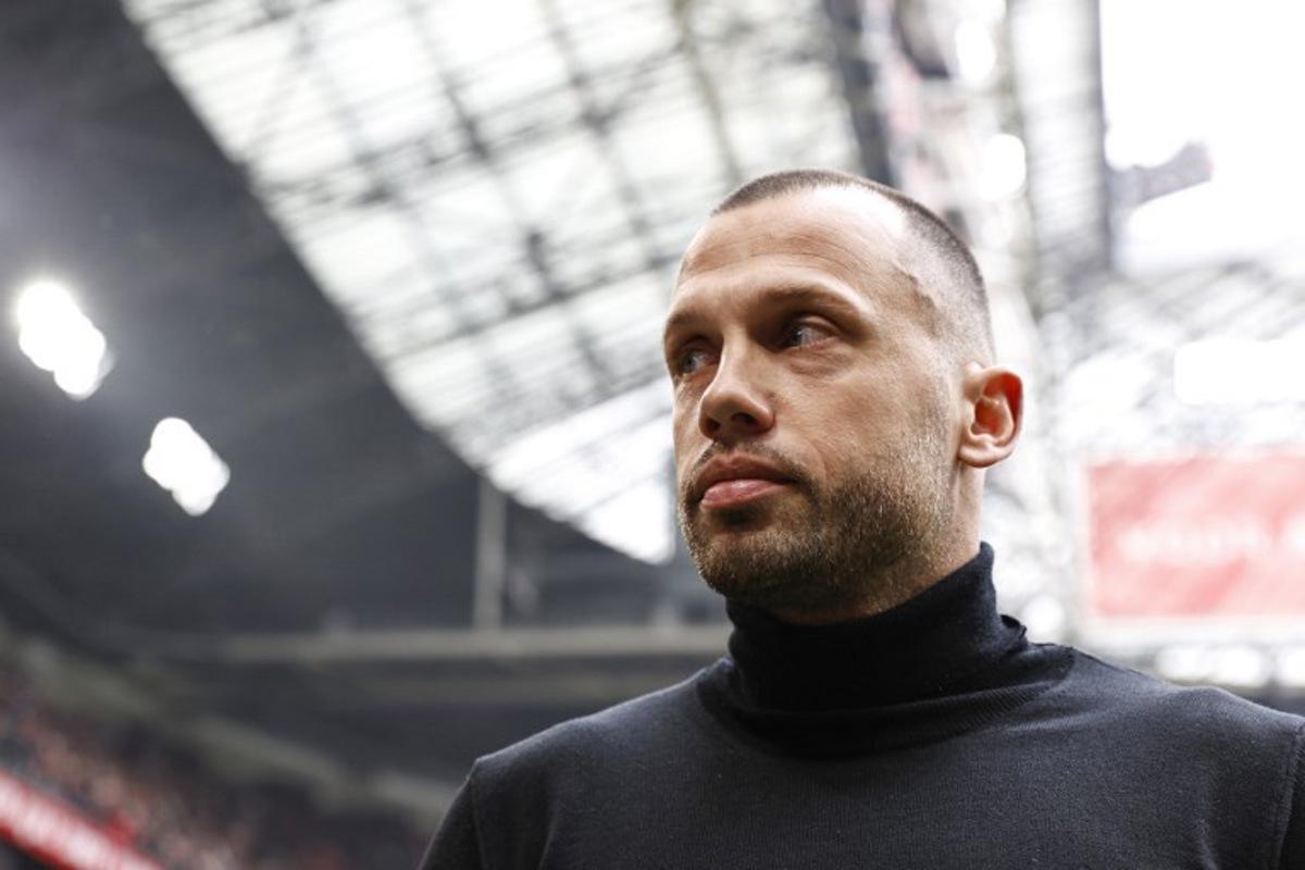 Ajax' Dutch head coach John Heitinga looks on during the Dutch Eredivisie premier league match between Ajax Amsterdam and Feyenoord at the Johan Cruijff ArenA in Amsterdam on March 19, 2023.  MAURICE VAN STEEN / ANP / AFP