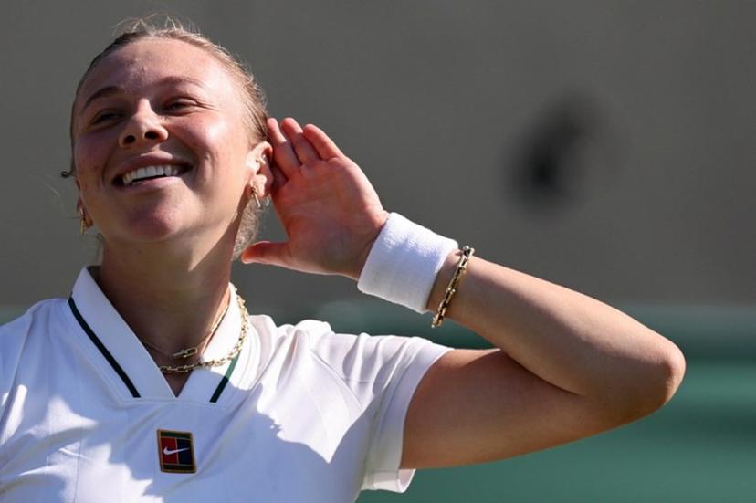 US player Amanda Anisimova celebrates beating US player Sofia Kenin during their women's singles second round tennis match on the fourth day of the 2026 Wimbledon Championships at The All England Lawn Tennis and Croquet Club in Wimbledon, southwest London, on July 2, 2026.  Henry Nicholls / AFP
