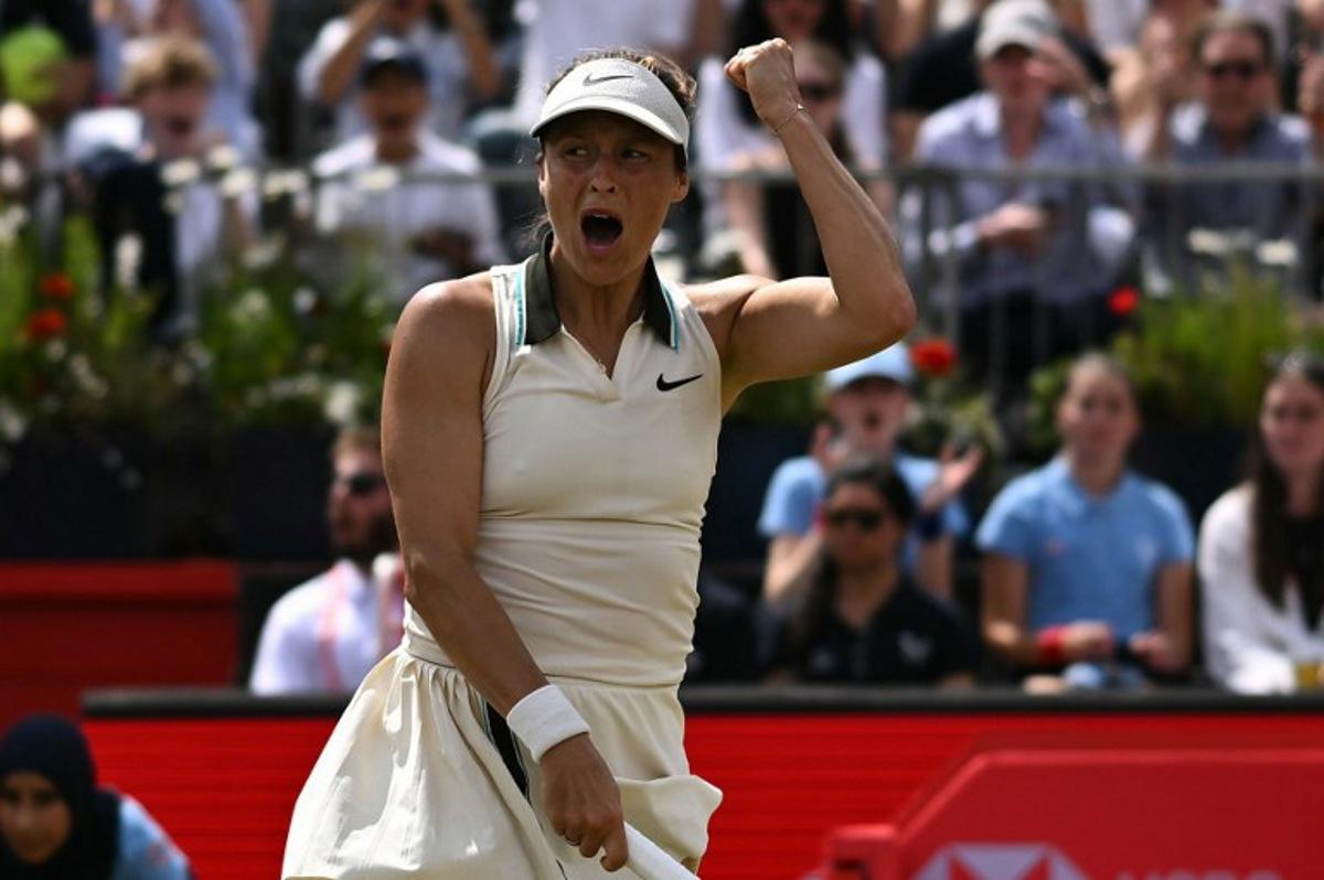 German player Tatjana Maria celebrates winning the set against US player Amanda Anisimova during their women's singles final tennis match on the last day of the HSBC WTA tennis Championships at Queen's Club in west London on June 15, 2025.  Ben STANSALL / AFP
