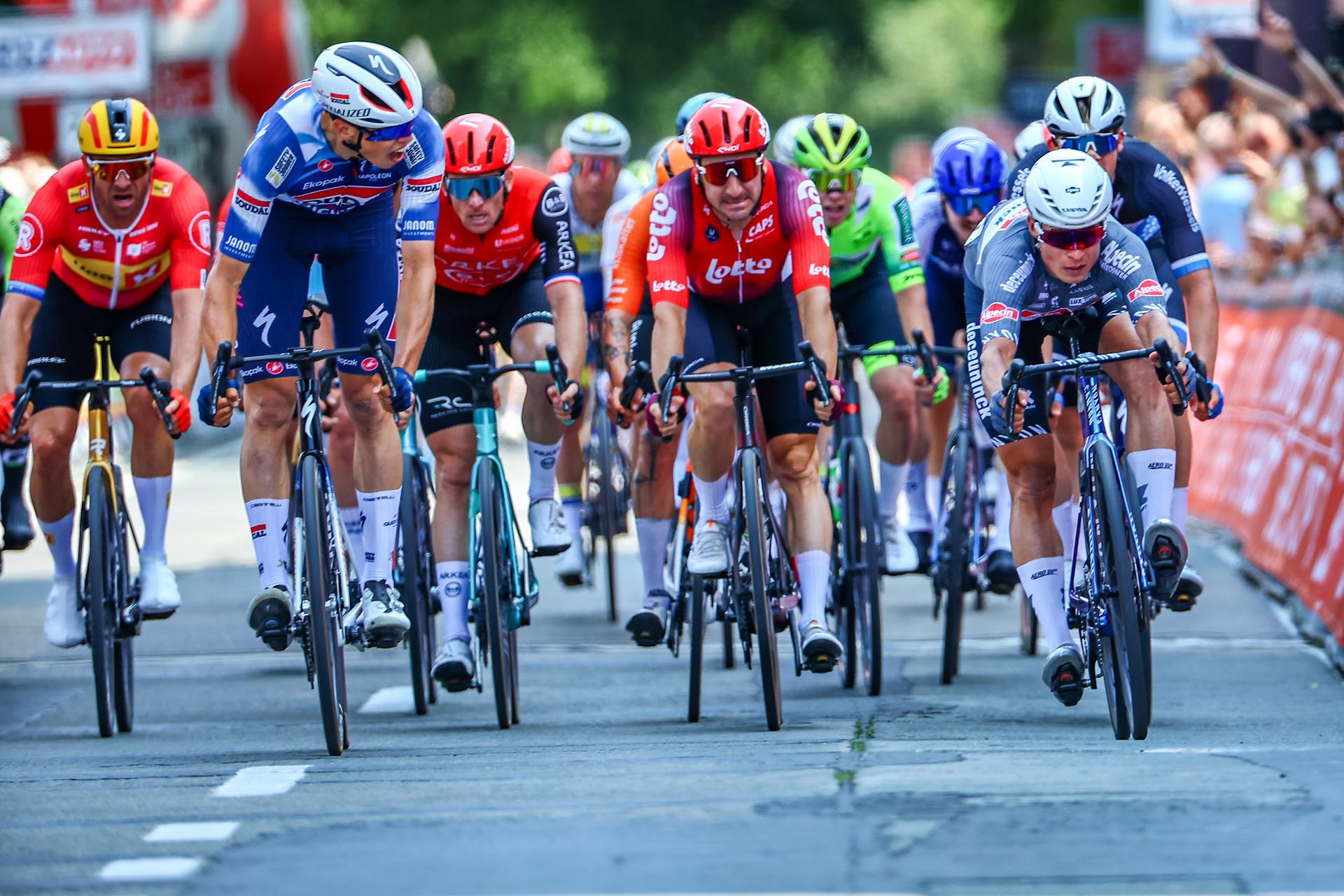 French Paul Magnier of Soudal Quick-Step and Belgian Jasper Philipsen of Alpecin-Deceuninck pictured in action during the Elfstedenronde one day cycling race, race 4 (out of 8) of the Lotto Belgium Cup, 196 km with start and finish in Brugge, Sunday 15 June 2025. BELGA PHOTO DAVID PINTENS