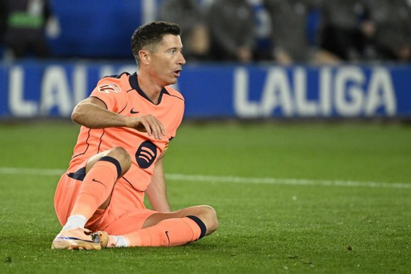 Barcelona's Polish forward #09 Robert Lewandowski reacts during the Spanish league football match between Deportivo Alaves and FC Barcelona at Mendizorroza Stadium in Vitoria on May 13, 2026.  ANDER GILLENEA / AFP