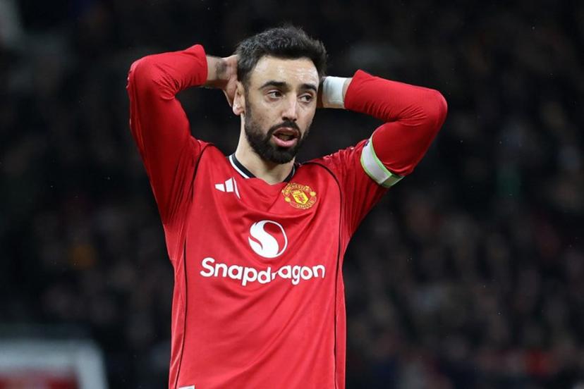 Manchester United's Portuguese midfielder #08 Bruno Fernandes reacts to a missed chance during the English Premier League football match between Manchester United and Everton at Old Trafford in Manchester, north west England, on November 24, 2025.  Darren Staples / AFP