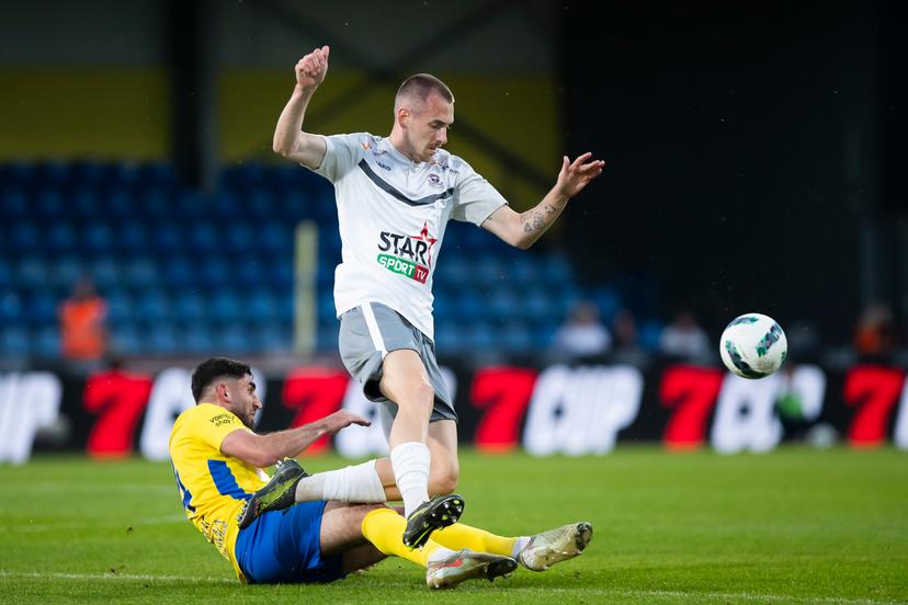 Westerlo's Dogucan Haspolat and Dender's Roman Kvet pictured during a soccer match between KVC Westerlo and FCV Dender EH, Friday 02 May 2025 in Westerlo, on day 7 (out of 10) of the Europe Play-offs of the 2024-2025 'Jupiler Pro League' first division of the Belgian championship. BELGA PHOTO KRISTOF VAN ACCOM