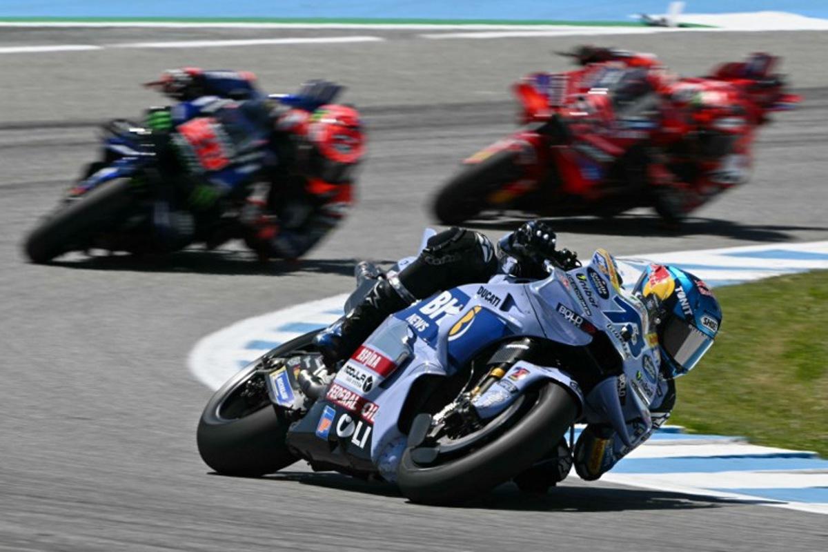 Gresini Racing MotoGP's Spanish rider Alex Marquez rides ahead of Monster Energy Yamaha MotoGP's French rider Fabio Quartararo and Ducati Lenovo Team's Italian rider Francesco Bagnaia during the MotoGP Spanish Grand Prix at the Jerez racetrack in Jerez de la Frontera, on April 27, 2025.  JAVIER SORIANO / AFP