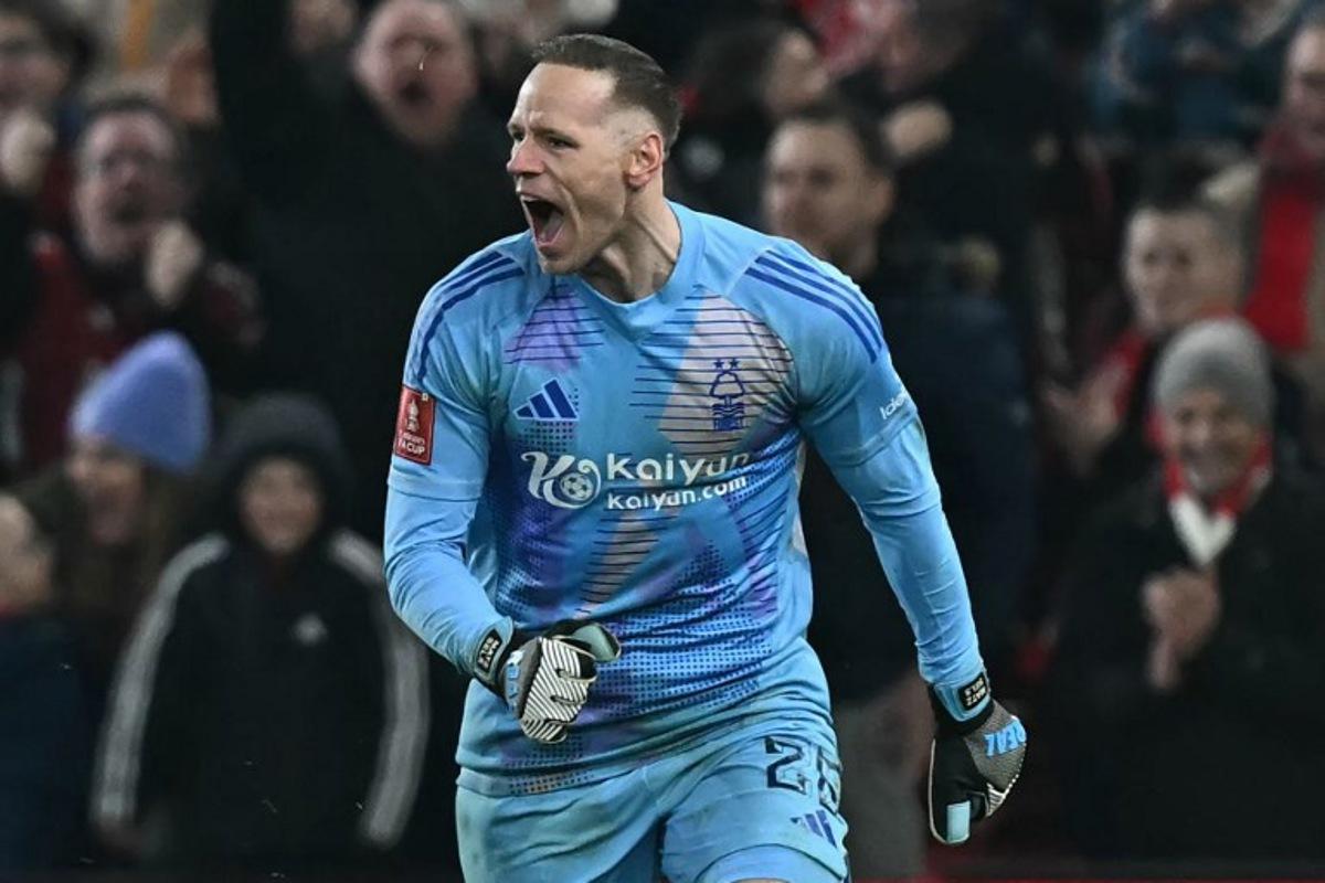 Nottingham Forest's Belgian goalkeeper #26 Matz Sels celebrates after saving a penalty from Ipswich Town's Irish midfielder #14 Jack Taylor to win the penalty shoot-out during the English FA Cup fifth round football match between Nottingham Forest and Ipswich Town at The City Ground in Nottingham, central England, on March 3, 2025. Forest won the penalty shoot-out 5-4 after the game finished 1-1 after extra time. Paul ELLIS / AFP