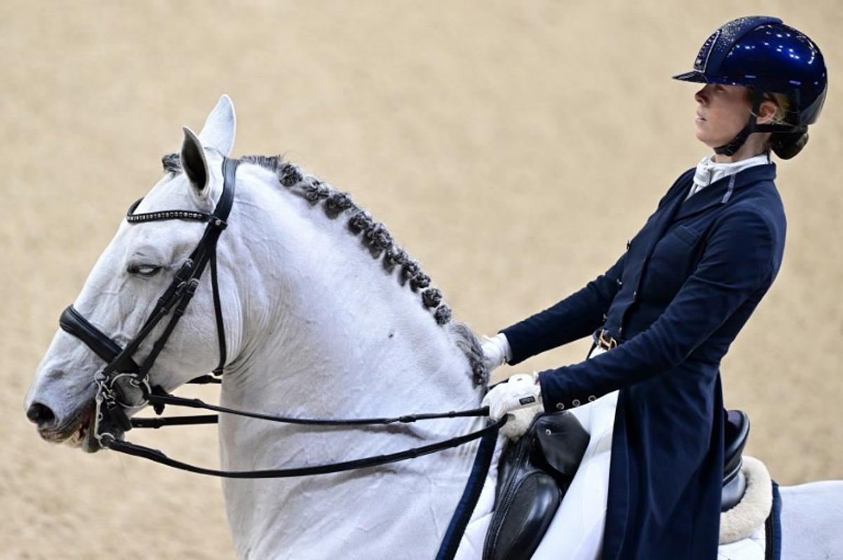 Belgium's Alexa Fairchild is pictured with the horse Mala Skala's Hermes during the FEI Dressage World Cup Grand Prix at the Gothenburg Horse Show at the Scandinavium Arena in Gothenburg, Sweden, on February 21, 2025.   Bjorn LARSSON ROSVALL / TT NEWS AGENCY / AFP