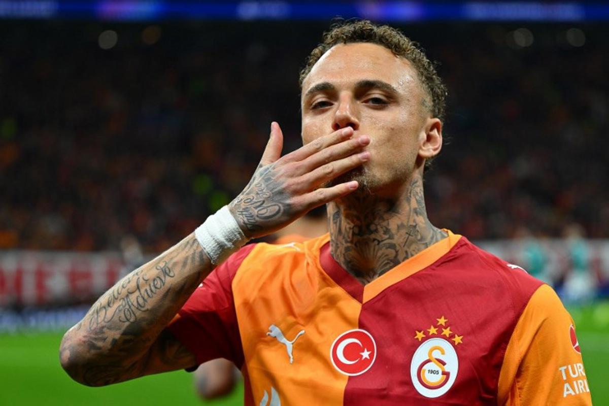 Galatasaray's Dutch forward #77 Noa Lang gestures during the UEFA Champions League round of 16 first leg football match between Galatasaray SK and Liverpool FC at the Ali Sami Yen Sports Complex in Istanbul on March 10, 2026.  YASIN AKGUL / AFP