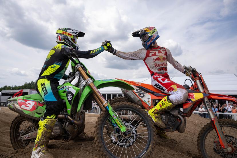 France's Romain Febvre and Belgium's Lucas Coenen celebrate after they crosses the finish line at the motocross MXGP Grand Prix Flanders, race 15/20 of the FIM Motocross World Championship, Sunday 03 August 2025 in Lommel. BELGA PHOTO JONAS ROOSENS