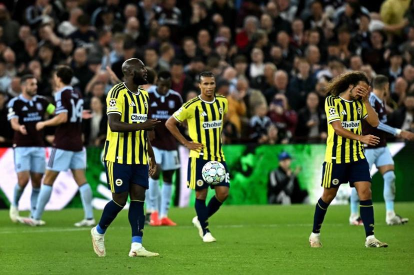 Fenerbahce's Belgian striker #09 Romelu Lukaku reacts after Aston Villa's English midfielder #06 Ross Barkley scores the team's fifth goal during the UEFA Champions League, league phase football match between Aston Villa and Fenerbahce at Villa Park in Birmingham, central England on October 14, 2026. Paul ELLIS / AFP