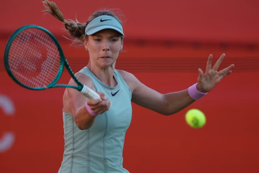 Britain's Katie Boulter returns against Kazakhstan's Elena Rybakina during their women's singles quarter-final tennis match at the HSBC WTA Championships at Queen's Club in west London on June 12, 2026. Adrian Dennis / AFP