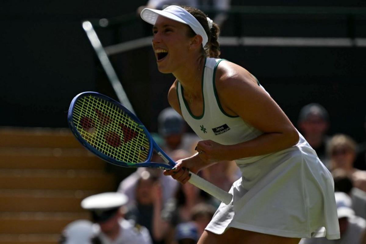 Belgium's Elise Mertens celebrates winning against Kazakhstan's Elena Rybakina during their women's singles third round tennis match on the sixth day of the 2026 Wimbledon Championships at The All England Lawn Tennis and Croquet Club in Wimbledon, southwest London, on July 4, 2026. Glyn KIRK / AFP