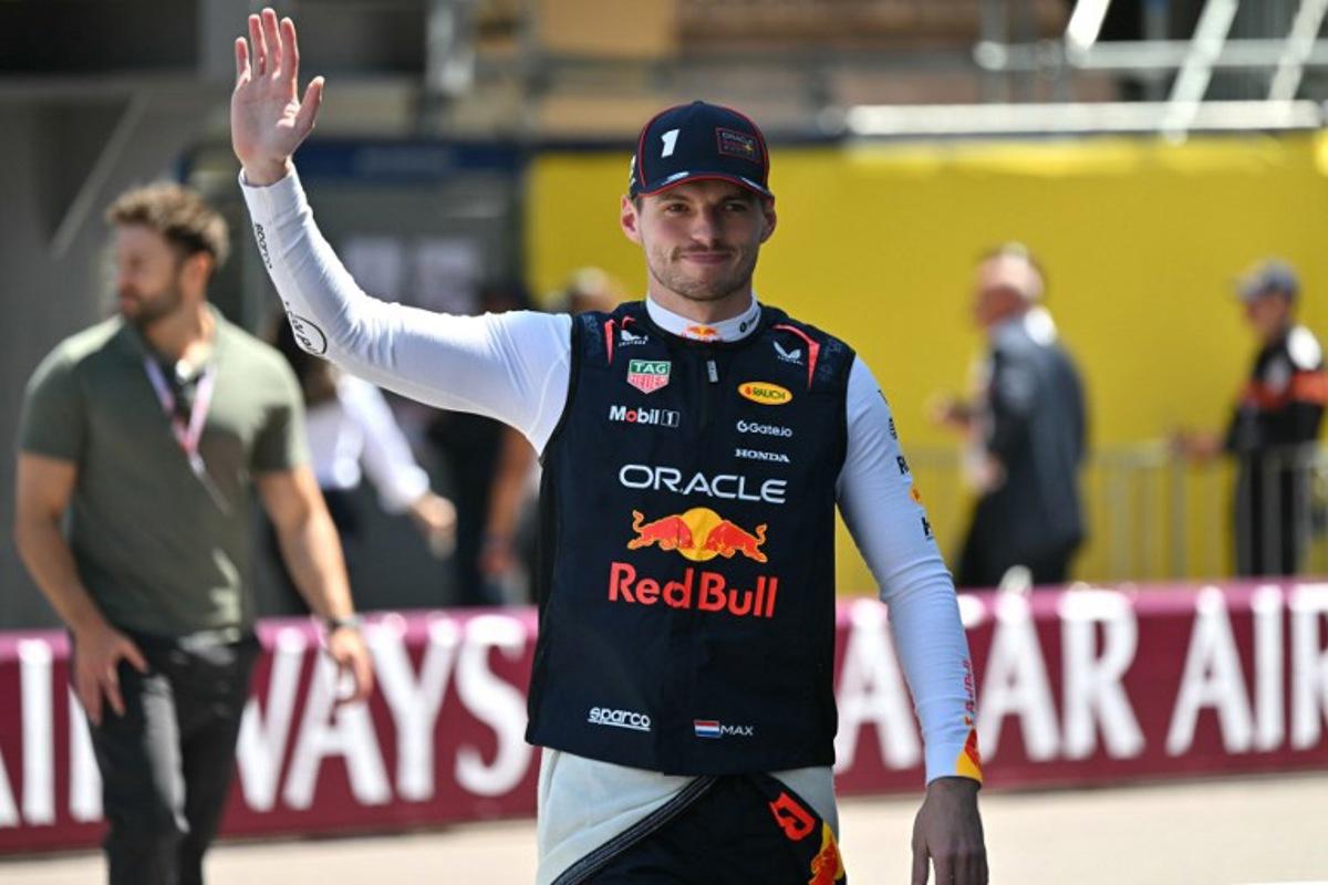 Red Bull Racing's Dutch driver Max Verstappen waves as he arrives at the track ahead of the Formula One Monaco Grand Prix at the Circuit de Monaco, on May 25, 2025. Andrej ISAKOVIC / AFP