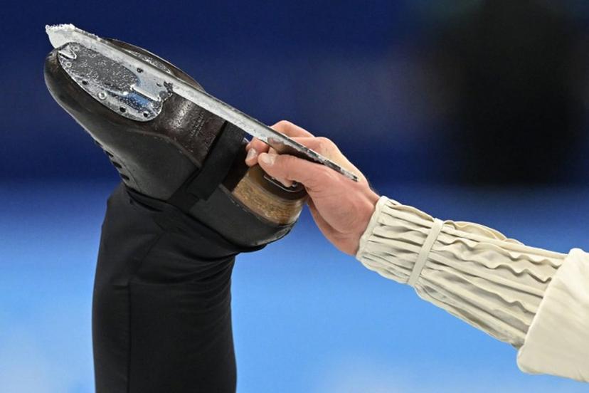 Latvia's Deniss Vasiljevs competes in the men's single skating free skating of the figure skating event during the Beijing 2022 Winter Olympic Games at the Capital Indoor Stadium in Beijing on February 10, 2022. WANG Zhao / AFP
