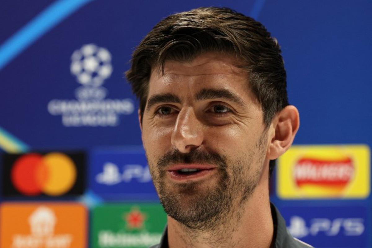 Real Madrid's Belgian goalkeeper #01 Thibaut Courtois speaks during a press conference at the Emirates stadium in London on April 7, 2025, on the eve of their UEFA Champions League Quarter-final first leg football match against Arsenal. Adrian Dennis / AFP