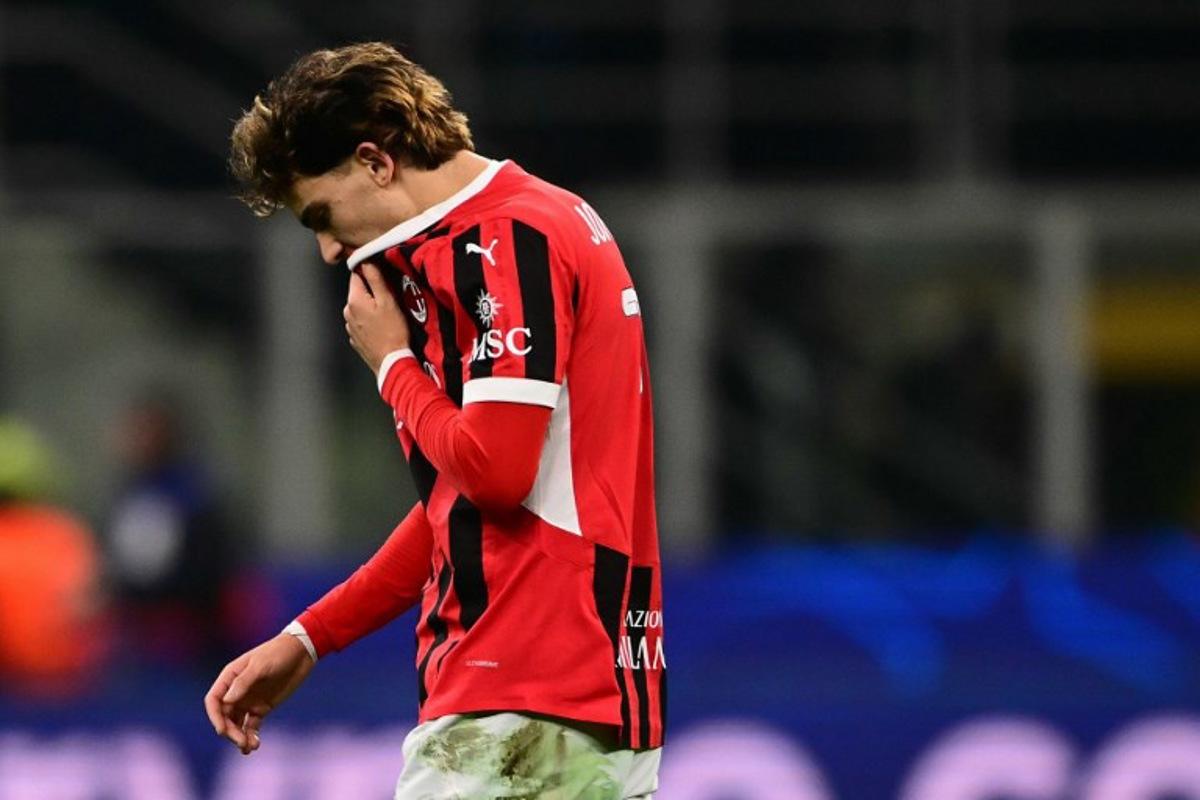 AC Milan's Portughese forward #79 Joao Félix reacts at the end of the UEFA Champions League knockout round play-off second leg football match between AC Milan and Feyenoord at San Siro stadium in Milan, on February 18, 2025. Marco BERTORELLO / AFP