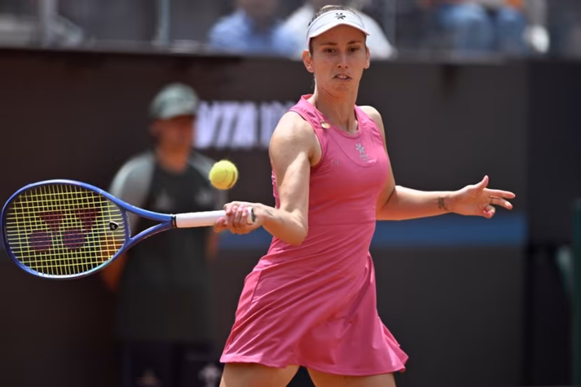 Belgium's Elise Mertens hits a return to Italy's Jasmine Paolini during the WTA Rome Open tennis tournament at Foro Italico in Rome on May 9, 2026. Tiziana FABI / AFP