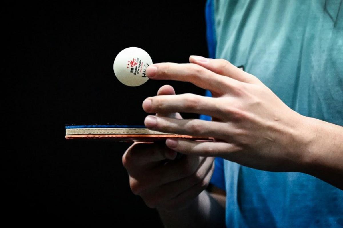 Hong Kong Yiu Kwan To takes part in a training session with Hong Kong's Wong Chun during the third day of the table tennis competition at the Paris 2024 Olympic Games at the South Paris Arena in Paris on July 29, 2024. Ben STANSALL / AFP