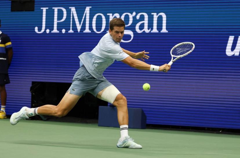 Belgium's Alexander Blockx returns the ball to Russia's Karen Khachanov during the men's singles quarter-final tennis match on day eleven of the US Open tennis tournament at the USTA Billie Jean King National Tennis Center in New York City on September 9, 2026. TIMOTHY A. CLARY / AFP