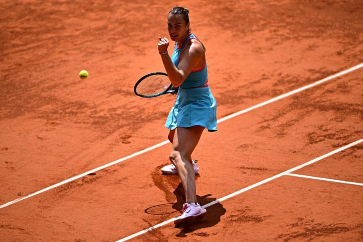 Belarus' Aryna Sabalenka celebrates after winning against China's Zheng Qinwen during their quarter-final women's singles match on day 10 of the French Open tennis tournament on Court Philippe-Chatrier at the Roland-Garros Complex in Paris on June 3, 2025. JULIEN DE ROSA / AFP