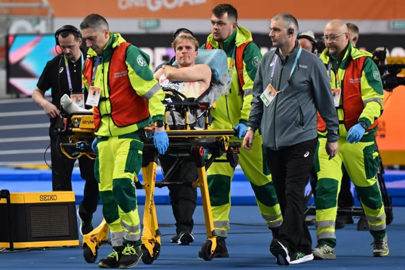 Belgium's Simon Verherstraeten is carried on a stretcher after the men's final 60 metres event during the World Athletics Indoor Championships Kujawy Pomorze 2026 in Torun, Poland on March 20, 2026. Andrej ISAKOVIC / AFP