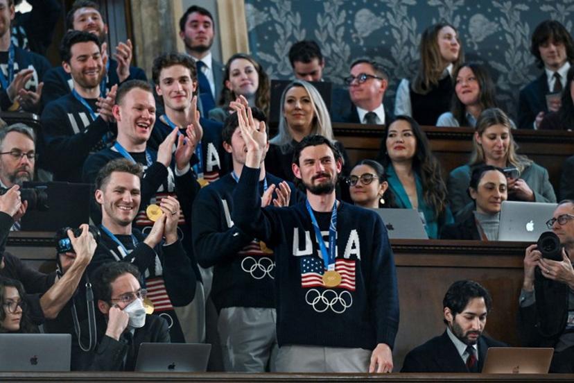Members of the United States Olympic Men's Ice Hockey Teamare seen in the gallery as President Donald J. Trump delivers the first State of the Union address of his second term to a joint session of Congress in the House Chamber of the United States Capitol in Washington, DC, on February 24, 2026. Kenny HOLSTON / POOL / AFP