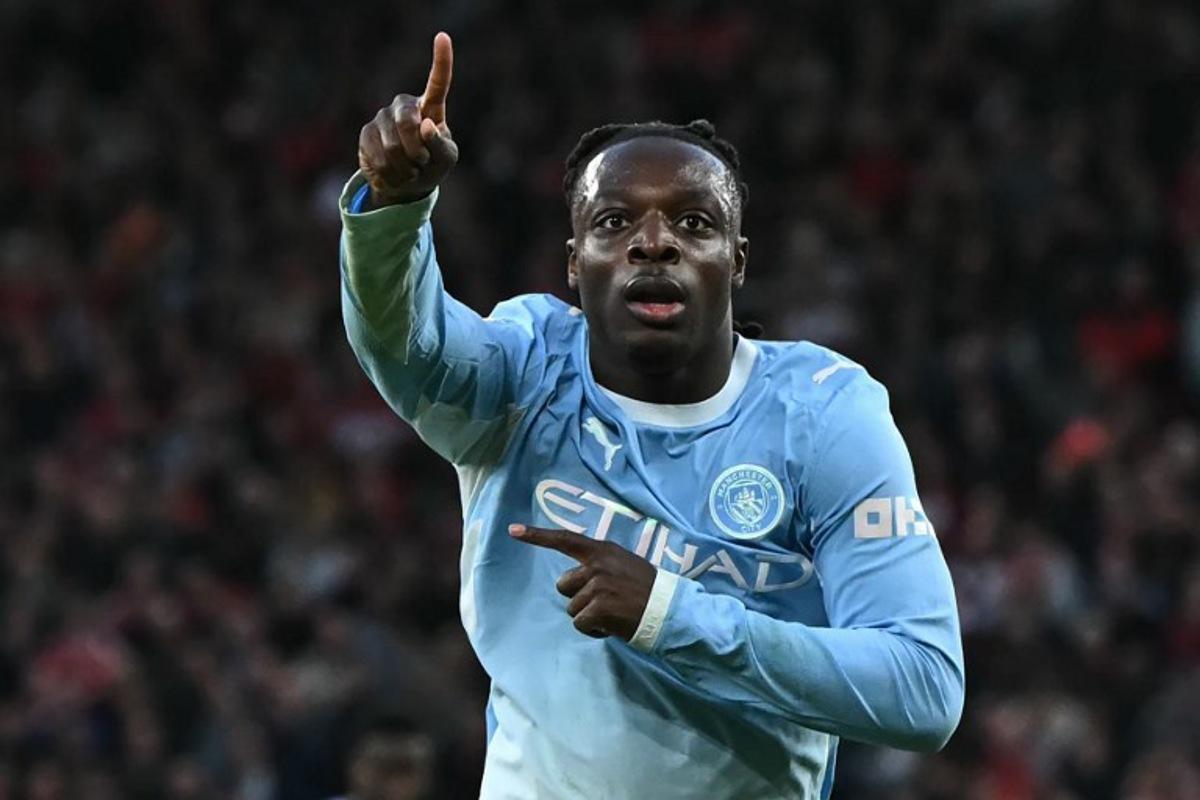Manchester City's Belgian midfielder #11 Jeremy Doku celebrates after scoring their second goal during the English Premier League football match between Liverpool and Manchester City at Anfield in Liverpool, north west England on October 11, 2026. Paul ELLIS / AFP