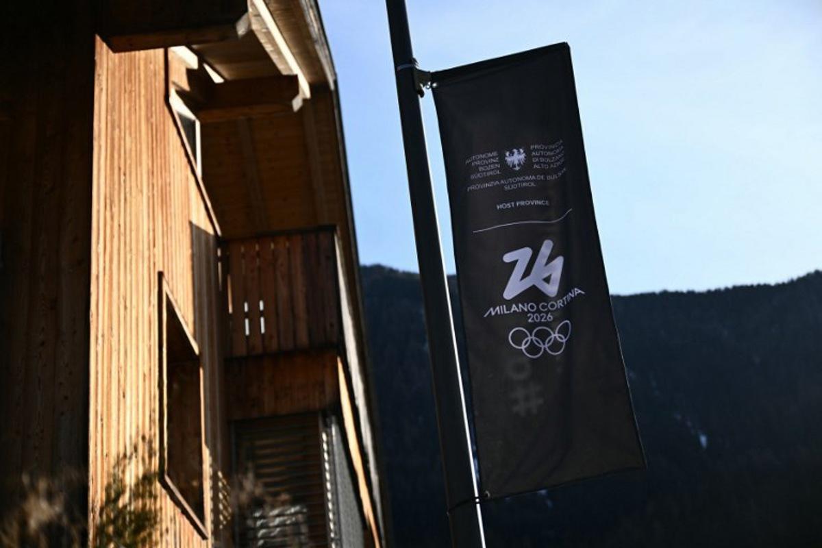 A banner with the logo of Milano Cortina 2026 Olympic Games is pictured in Anterselva / Antholz where the Biathlon Arena will host the competition, on January 24, 2025. Marco BERTORELLO / AFP