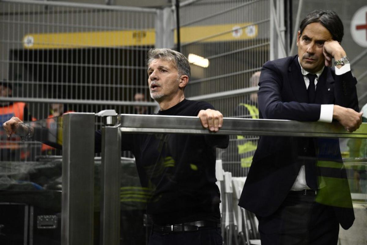 Lazio's Italian head coach Marco Baroni and Inter Milan's Italian coach Simone Inzaghi react during the Italian Serie A football match between Inter Milan and Lazio at San Siro stadium in Milan, on May 18, 2025. Nicolo Campo / AFP