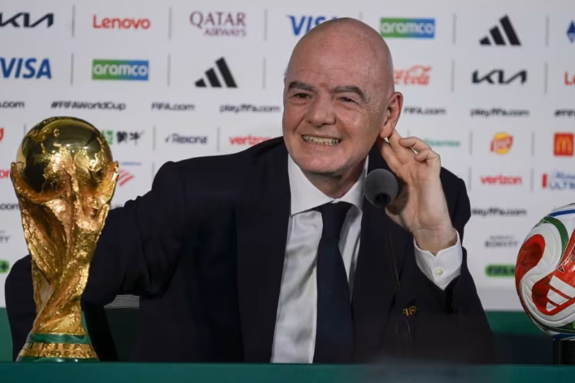 FIFA President Gianni Infantino gestures during a press conference with the World Cup trophy on the eve of the opening match of the 2026 World Cup football tournament at Mexico city stadium in Mexico City on June 10, 2026. Alfredo ESTRELLA / AFP