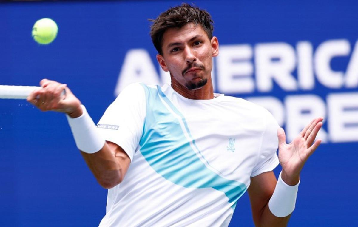 Australia's Alexei Popyrin plays a forehand return to Italy's Jannik Sinner during their men's singles second round tennis match on day five of the US Open tennis tournament at the USTA Billie Jean King National Tennis Center in New York City, on August 28, 2025. Kena Betancur / AFP