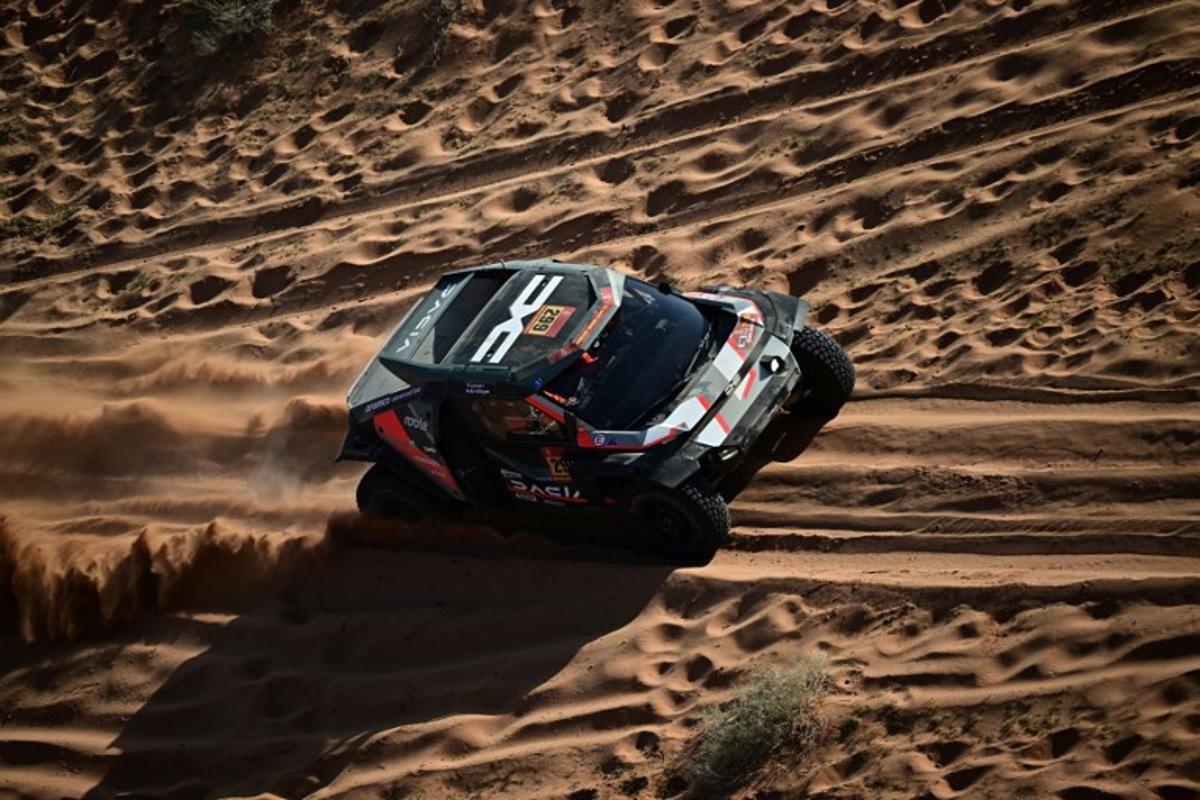 The Dacia Sandriders' Qatari driver Nasser Al-Attiyah and Belgian co-pilot Fabian Lurquin compete in the Stage 5 of the 48th edition of the Dakar Rally 2026, between Al-Ula and Hail, Saudi Arabia, on January 8, 2026. Giuseppe CACACE / AFP