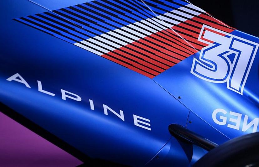 A picture taken at the Palais de Tokyo, in Paris on February 21, 2022, shows a view of the Alpine F1 team's A522 new racing car for the upcoming Formula One 2022 season, unveiled two days before the first pre-season track session of the year at the Circuit de Barcelona-Catalunya. The A522 will be raced this year by Fernando Alonso and Esteban Ocon, who'll team up for a second season at Alpine. FRANCK FIFE / AFP