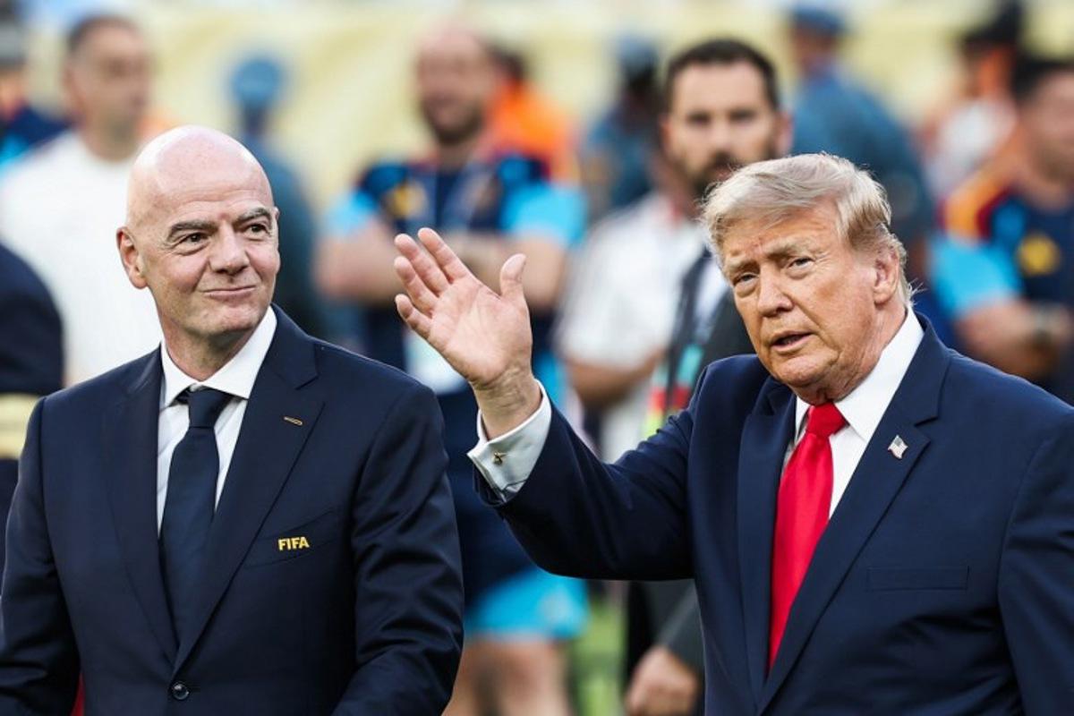US President Donald Trump (R) waves next to FIFA President Gianni Infantino (L) during the award ceremony of the 2026 World Cup football tournament final match between Spain and Argentina at the New York/New Jersey Stadium in East Rutherford on July 19, 2026. FRANCK FIFE / AFP