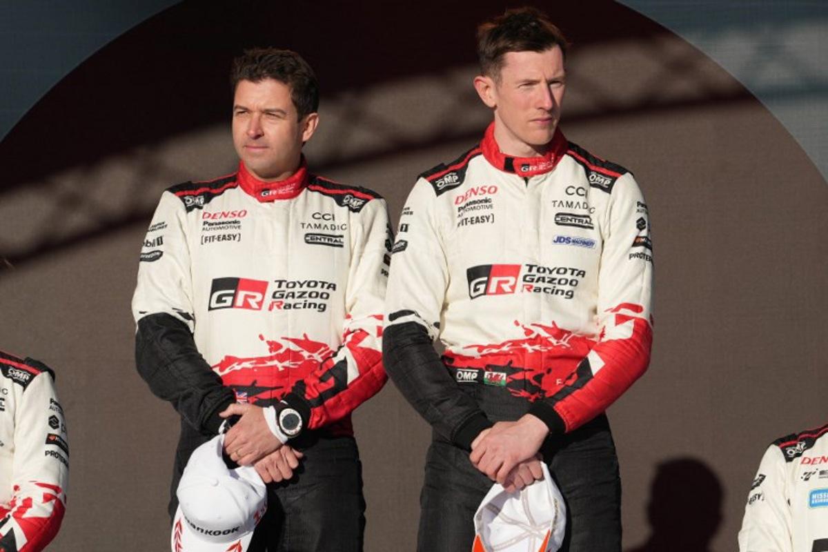 Winner British driver Elfyn Evans (R) and his co-driver Scott Martin pose on the podium after the final stage of Rally Sweden, the second round of the FIA World Rally Championship in Umea, Sweden, on February 15, 2026. Peo MOLLER / TT News Agency / AFP