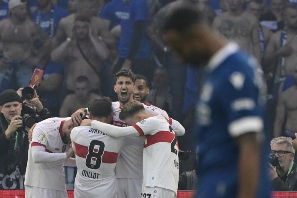 Stuttgart's team celebrates the 0-3 during the German Cup (DFB Pokal) final football match between Arminia Bielefeld and VfB Stuttgart at the Olympic Stadium in Berlin on May 24, 2025. John MACDOUGALL / AFP