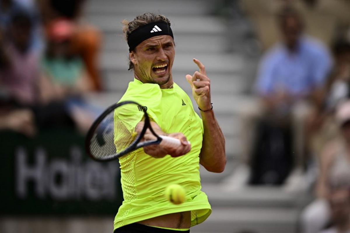 Germany's Alexander Zverev plays a forehand return to Netherlands' Jesper De Jong during their men's singles match on day 5 of the French Open tennis tournament on Court Simonne-Mathieu at the Roland-Garros Complex in Paris on May 29, 2025. JULIEN DE ROSA / AFP