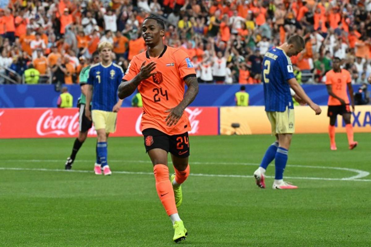 Netherlands' forward #24 Crysencio Summerville celebrates scoring his team's fifth goal during the 2026 World Cup Group F football match between the Netherlands and Sweden at the Houston Stadium in Houston on June 20, 2026. RONALDO SCHEMIDT / AFP
