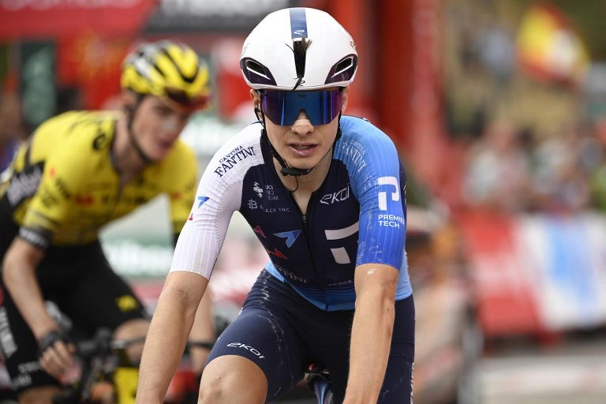 Team Israel Premier Tech 's US rider Matthew Riccitello crosses the finish line during the 14th stage of the Vuelta a Espana cycling tour, a 135 km race between Aviles and La Farrapona in Somiedo, on September 6, 2025. Cycling team Israel-Premier Tech removed their name from their kit at the Vuelta a Espana today after pro-Palestine protests aimed at them during the race. Miguel RIOPA / AFP