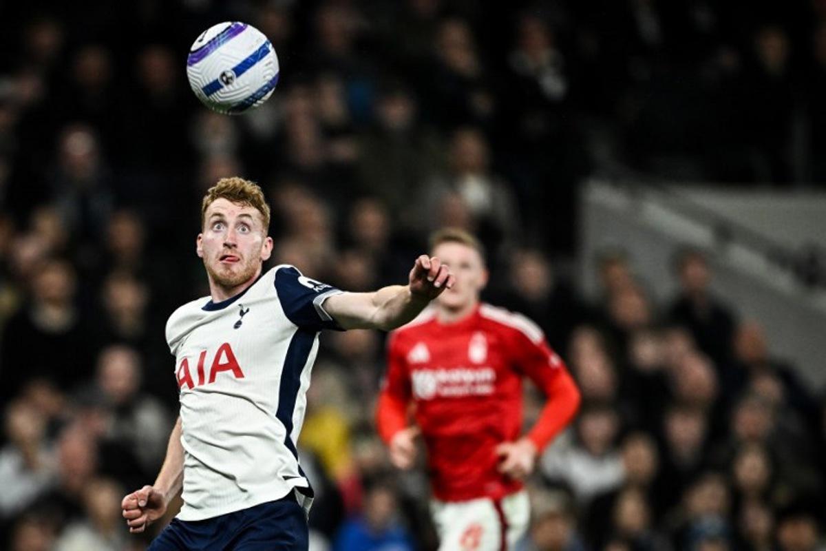 Tottenham Hotspur's Swedish midfielder #21 Dejan Kulusevski eyes the ball during the English Premier League football match between Tottenham Hotspur and Nottingham Forest at the Tottenham Hotspur Stadium in London, on April 21, 2025. Ben STANSALL / AFP