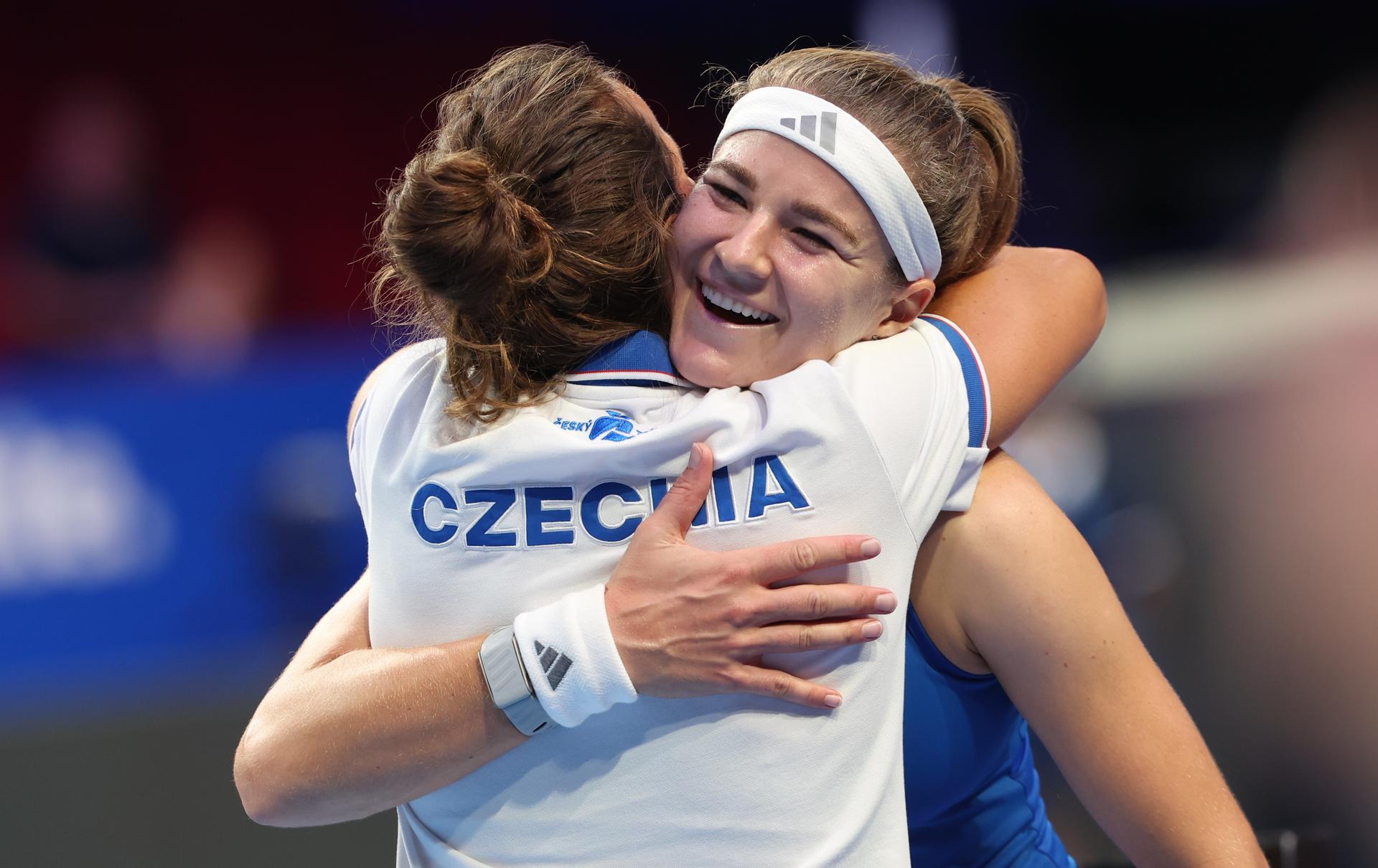 Czech Karolina Muchova and Barbora Strycova celebrate after winning the tennis match between Jessica Bouzas Maneiro of Spain and Karolína Muchová of Czech Republic in the Semi Finals of the Billie King Cup tournament, on Friday 25 September 2026 in Shenzhen, China. BELGA PHOTO VIRGINIE LEFOUR