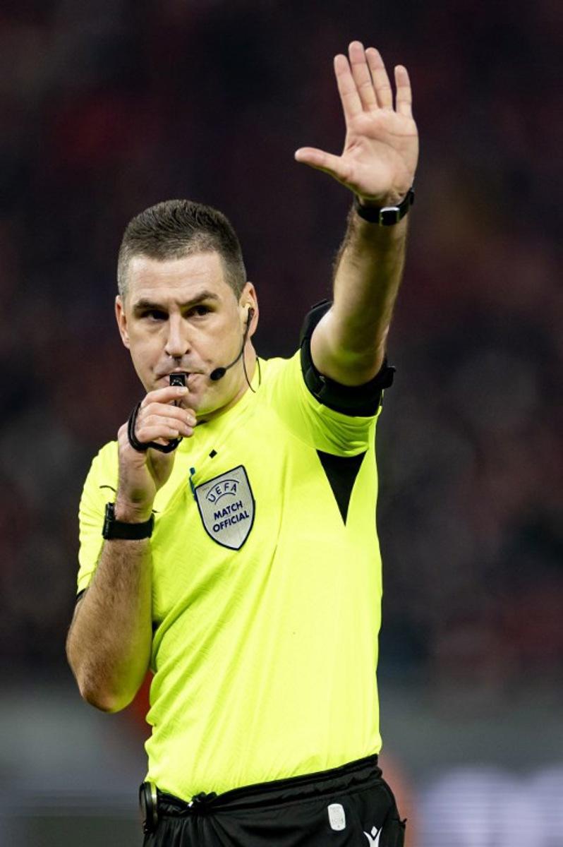 Slovenian referee Rade Obrenovic blows his whistle during the UEFA Champions League group C football match between Union Berlin and Real Madrid in Berlin, on December 12, 2023. Odd ANDERSEN / AFP